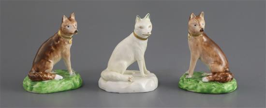 A pair of Derby porcelain figures of foxes and a similar gilt and white fox, c.1810-30 H. 7.2cm